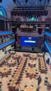 Interior view of the M&T Bank Exchange highlighting the blend of historic architecture and modern industrial design elements with regular lighting.
